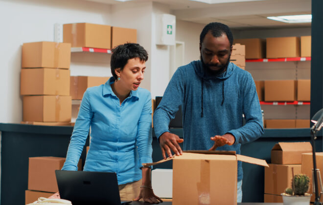 Team of owners doing highfive gesture after preparing storehouse order